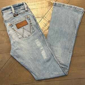 NWOT.... Wrangler High Rise Slim Boot Jeans